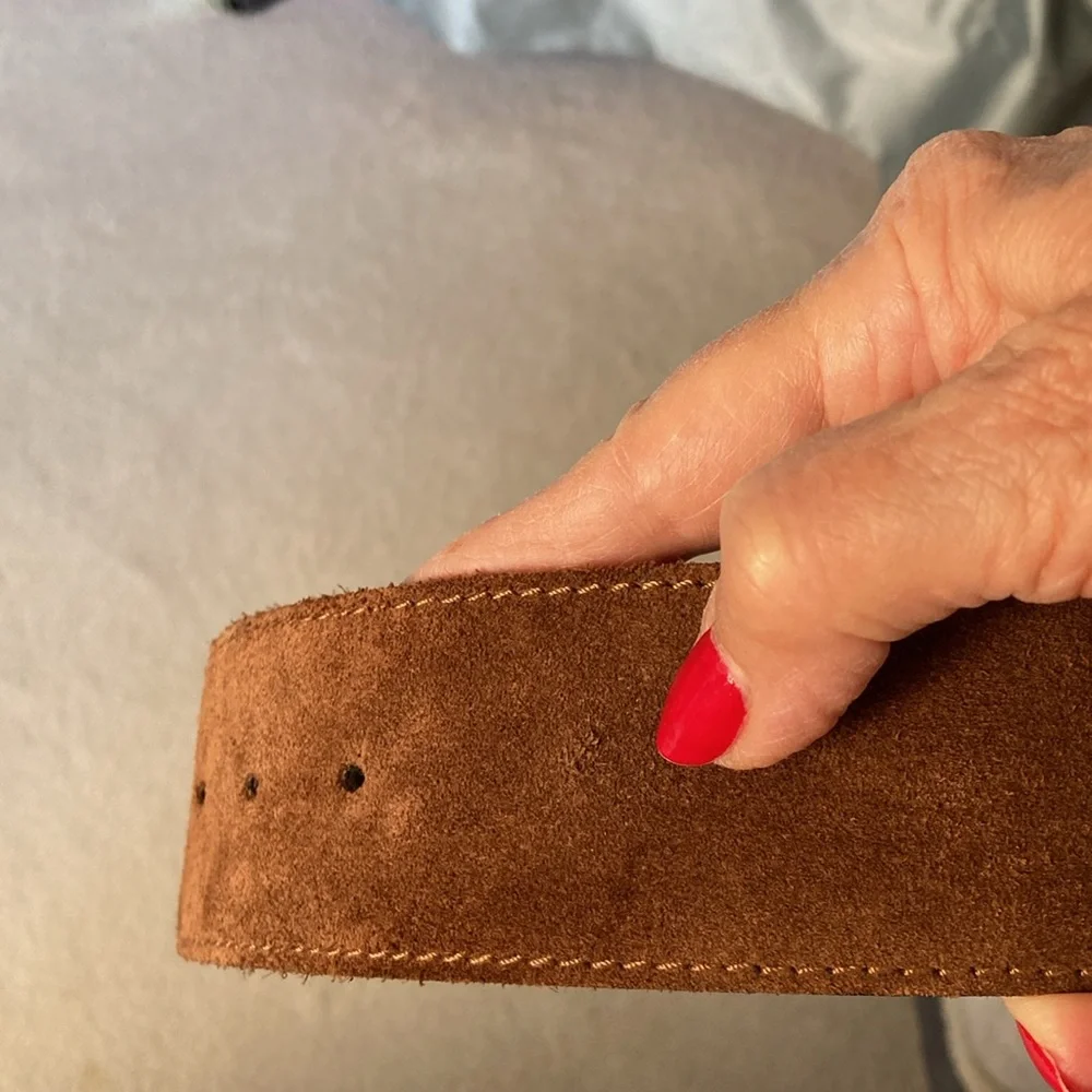 Genuine suede leather belt with one of a kind buckle.